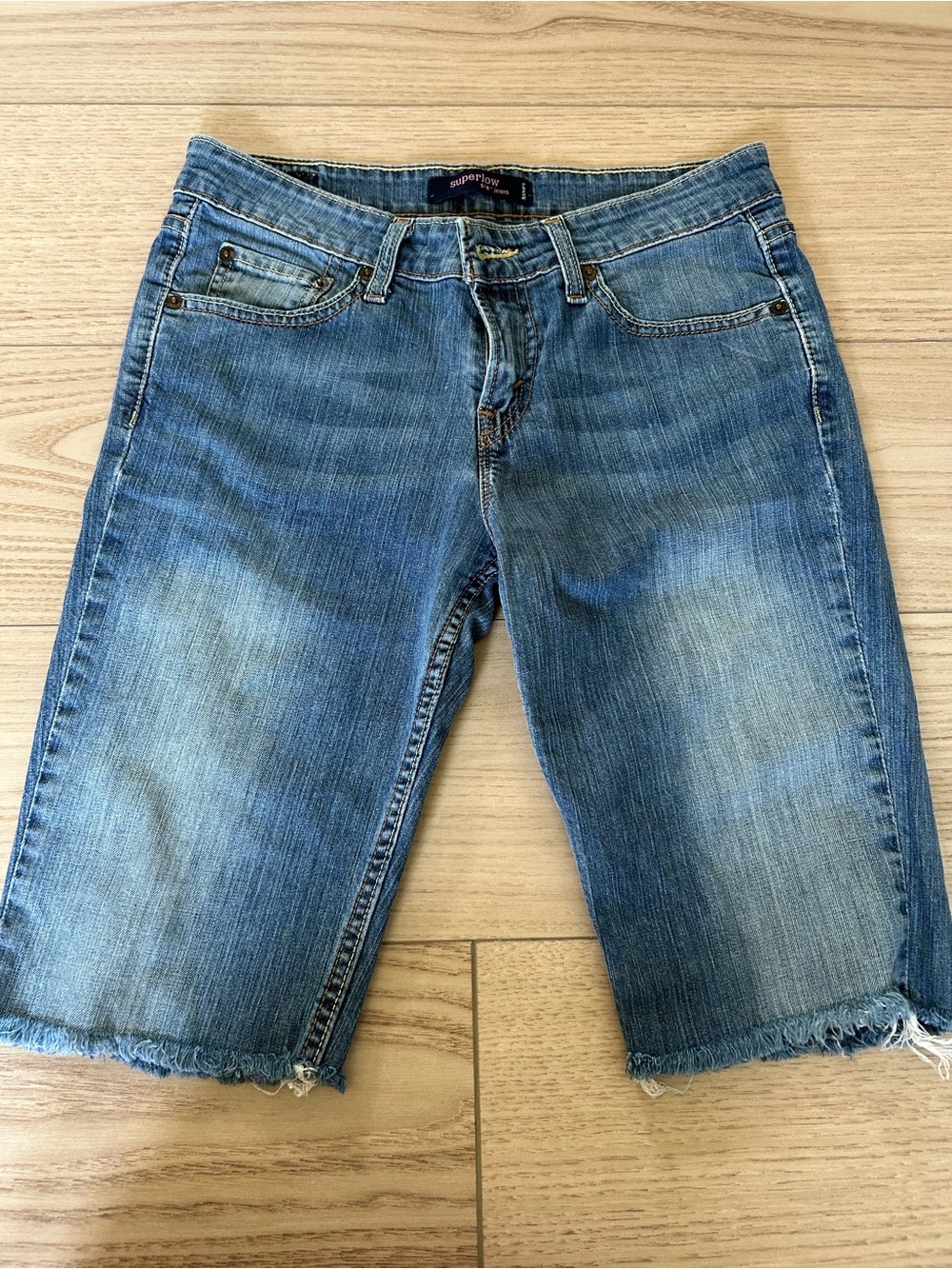 Levi's Women's Light Blue Distressed Denim Shorts
